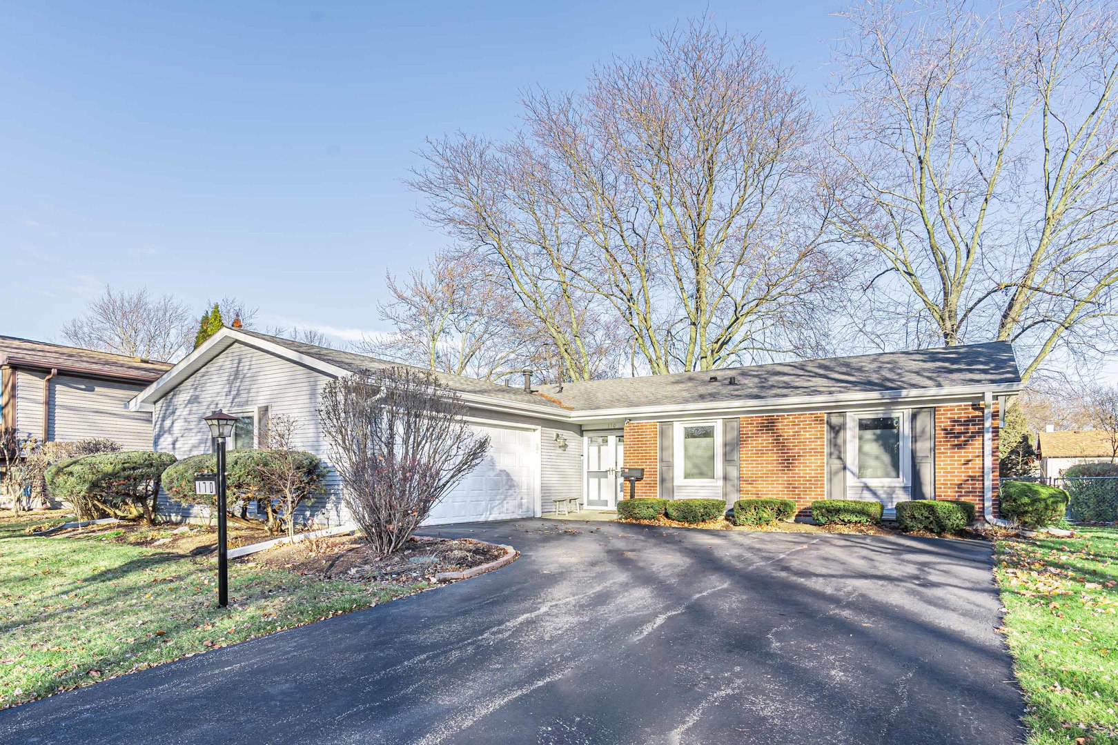 170 Old Mill Grove Road Lake Zurich, IL 60047 - Photo 1 of 23 a view of a house with a yard