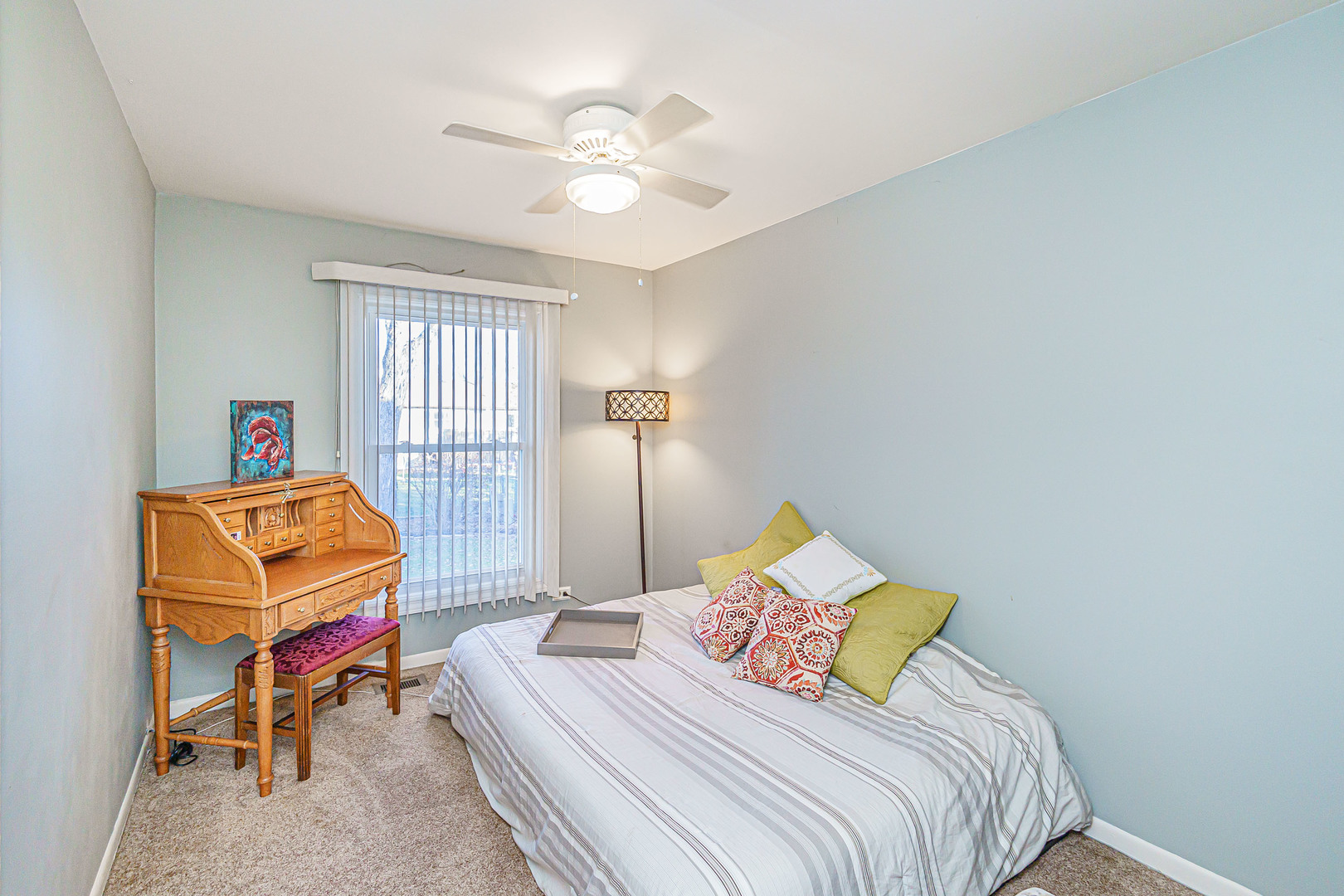 170 Old Mill Grove Road Lake Zurich, IL 60047 - Photo 14 of 23 a bedroom with a bed a chandelier and dresser