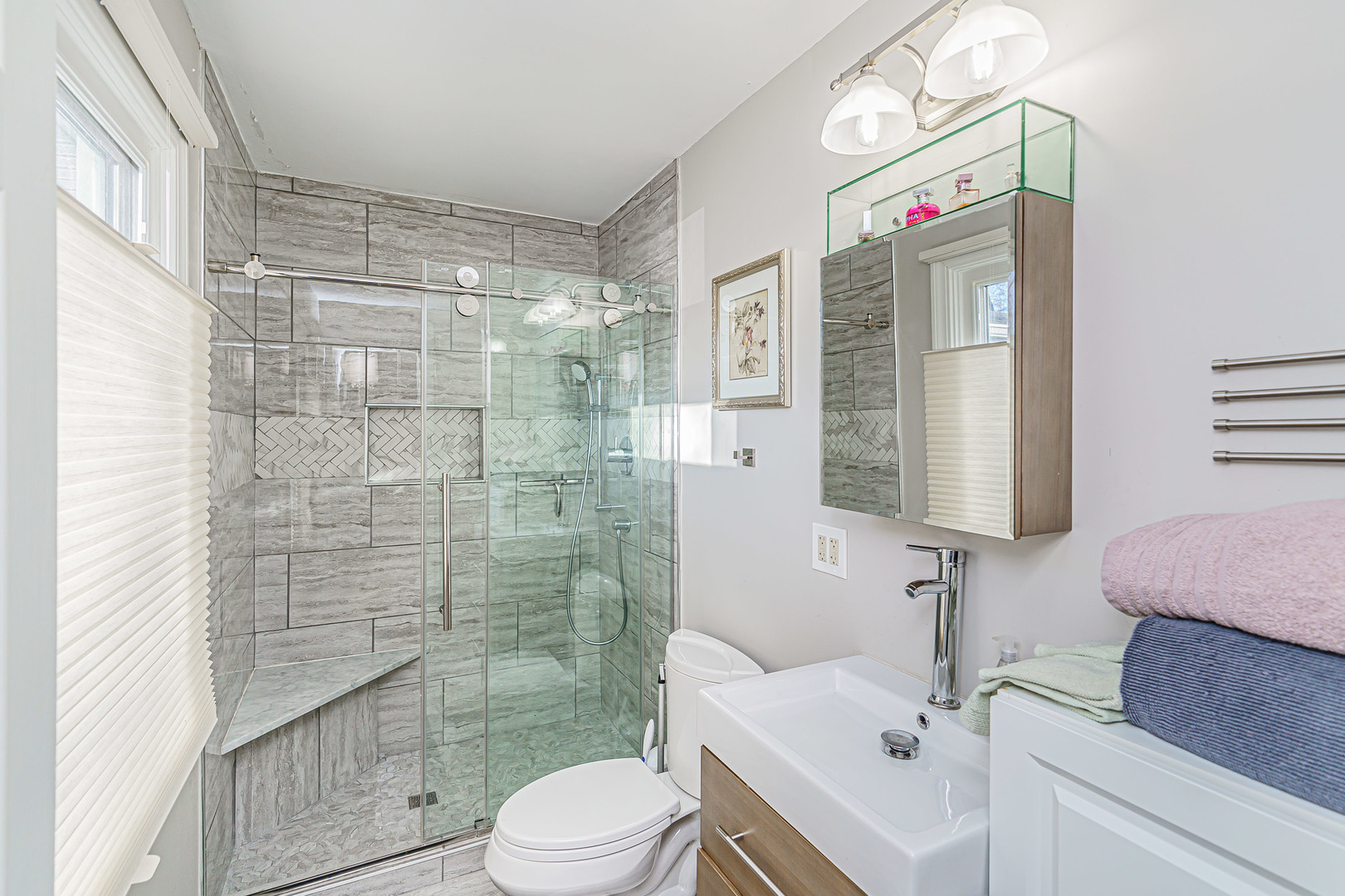 170 Old Mill Grove Road Lake Zurich, IL 60047 - Photo 17 of 23 a bathroom with a sink vanity granite toilet and shower