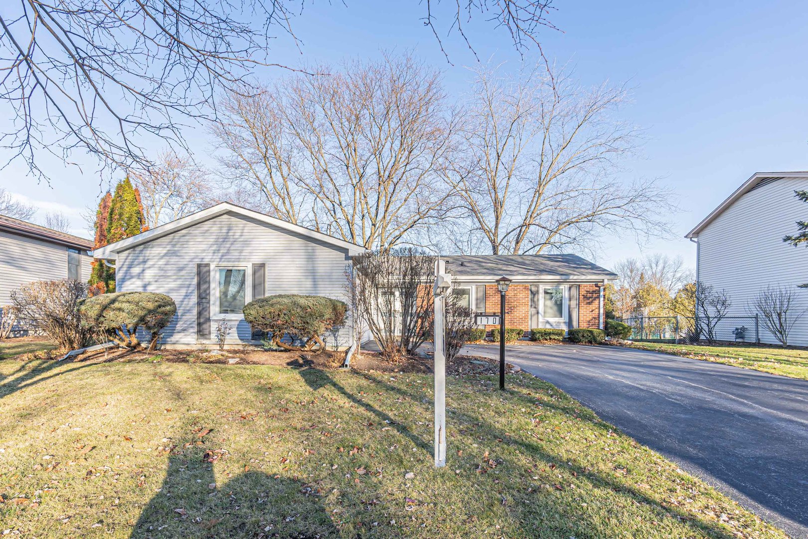 170 Old Mill Grove Road Lake Zurich, IL 60047 - Photo 2 of 23 a view of a yard with cars
