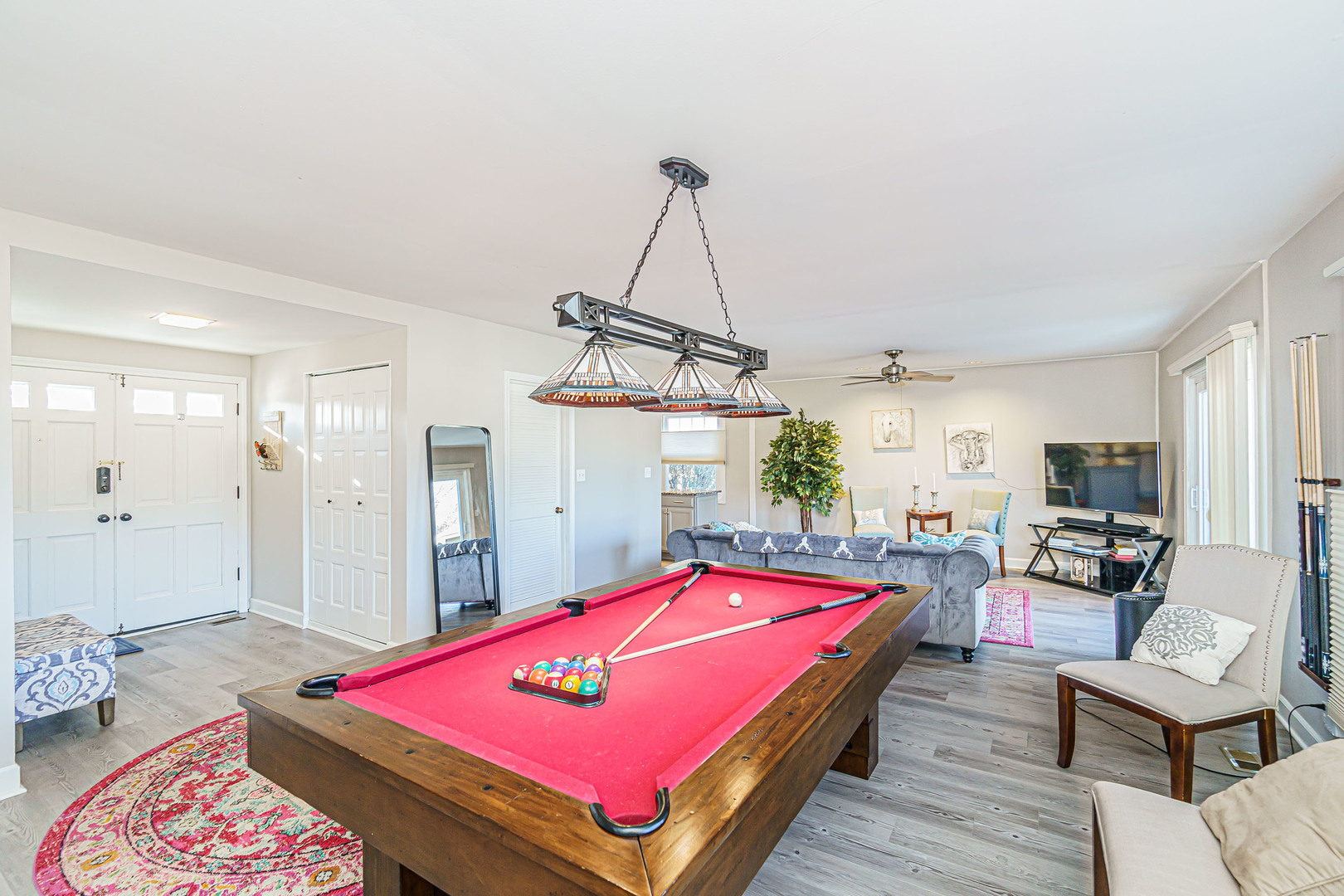 170 Old Mill Grove Road Lake Zurich, IL 60047 - Photo 8 of 23 a living room with furniture pool table and flat screen tv