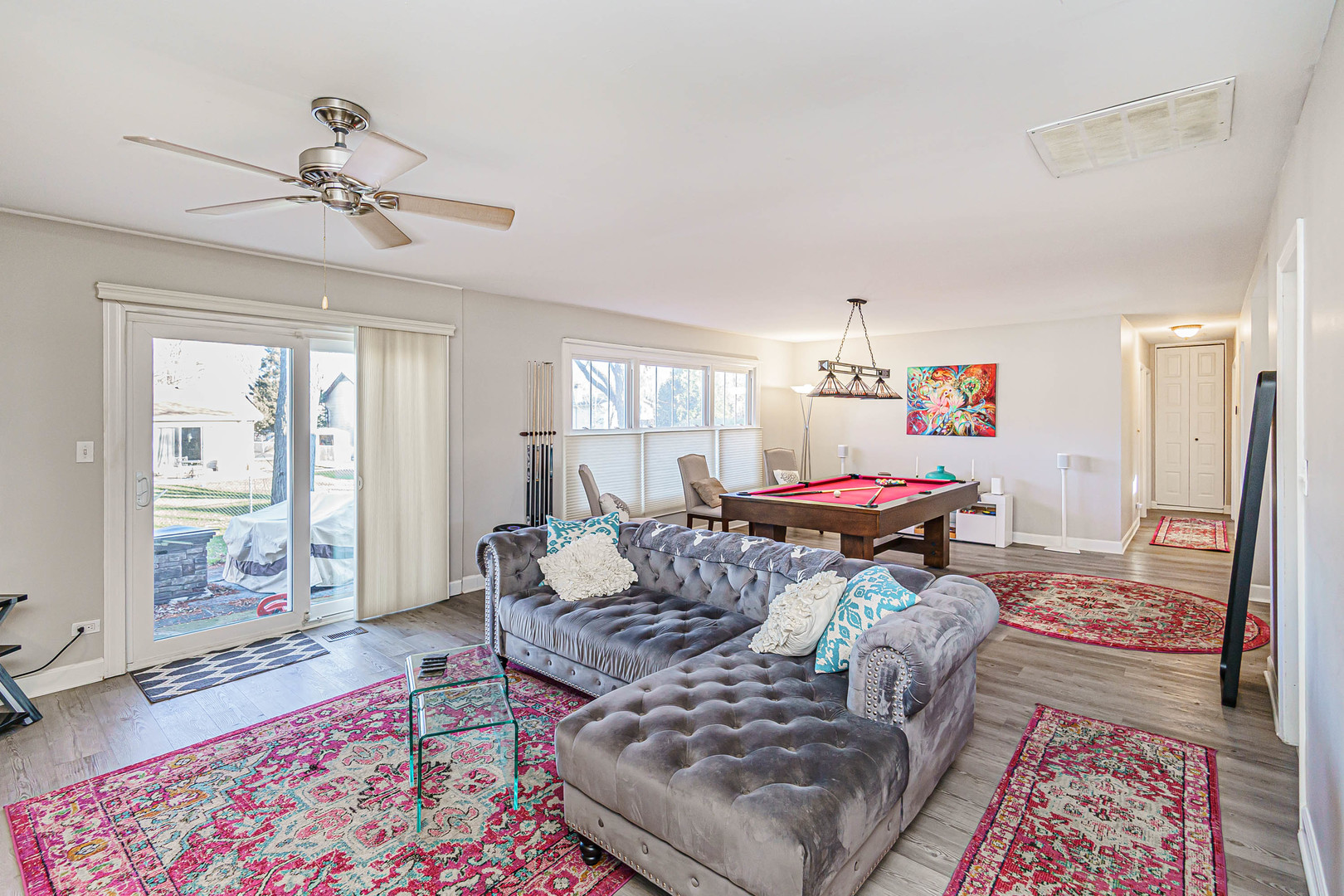 170 Old Mill Grove Road Lake Zurich, IL 60047 - Photo 9 of 23 a living room with furniture and a rug