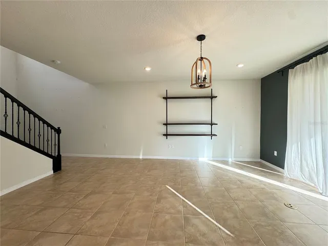 a view of a hallway with entryway