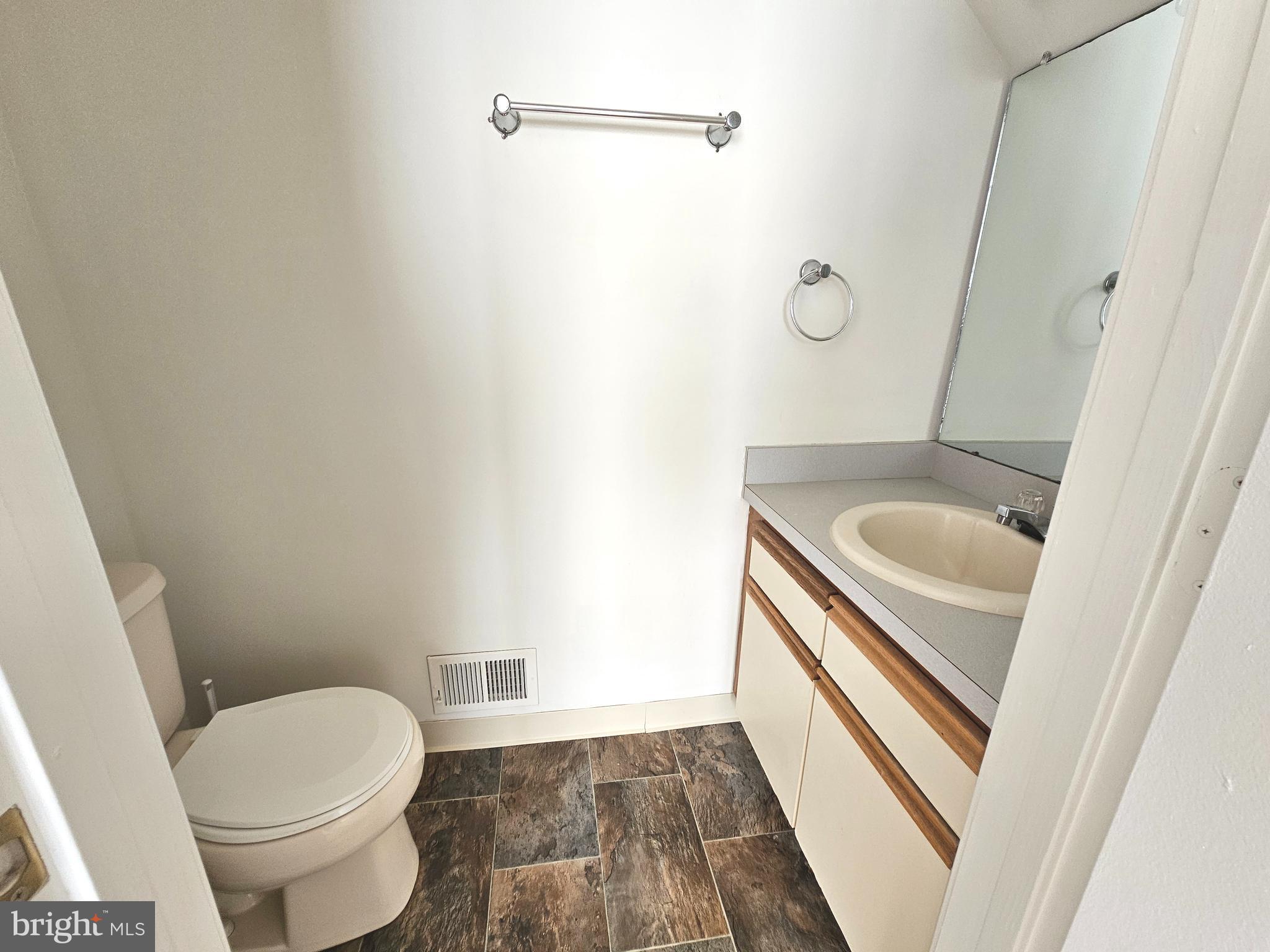 38 Heatherfield Way Dover, DE 19904 - Photo 11 of 26 a bathroom with a sink and a toilet