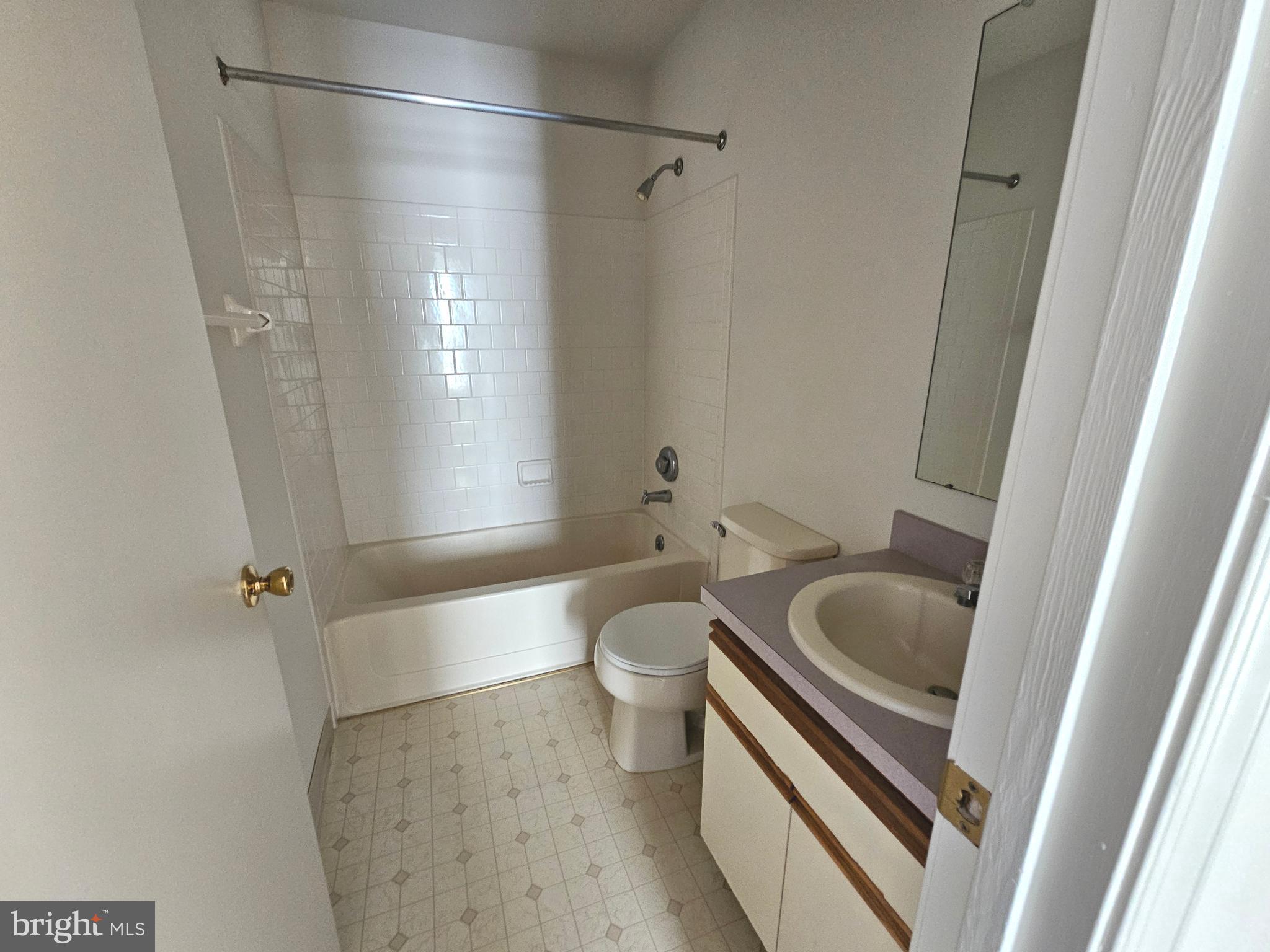 38 Heatherfield Way Dover, DE 19904 - Photo 23 of 26 a bathroom with a sink a toilet and shower