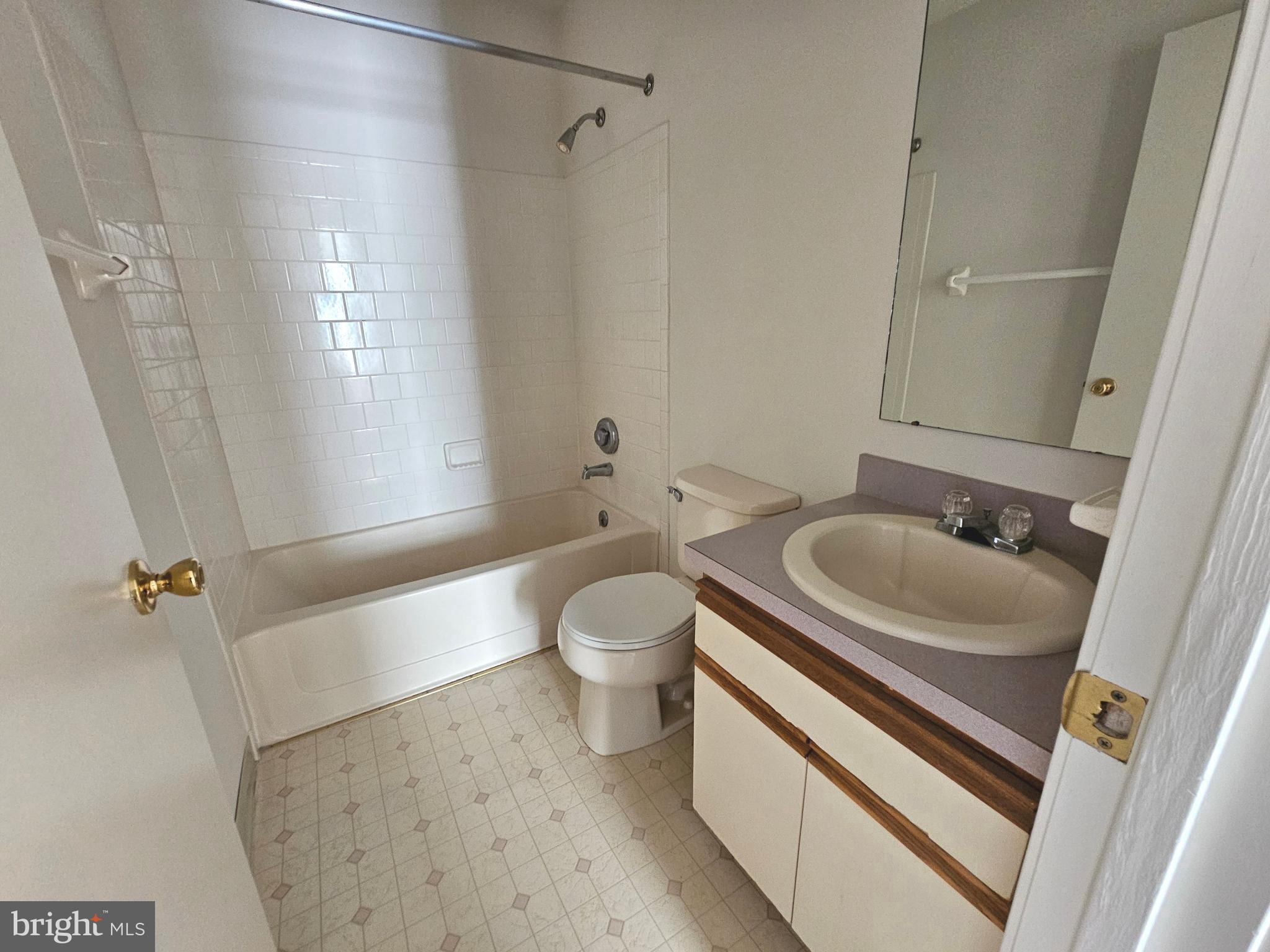 38 Heatherfield Way Dover, DE 19904 - Photo 24 of 26 a bathroom with a sink a toilet and shower