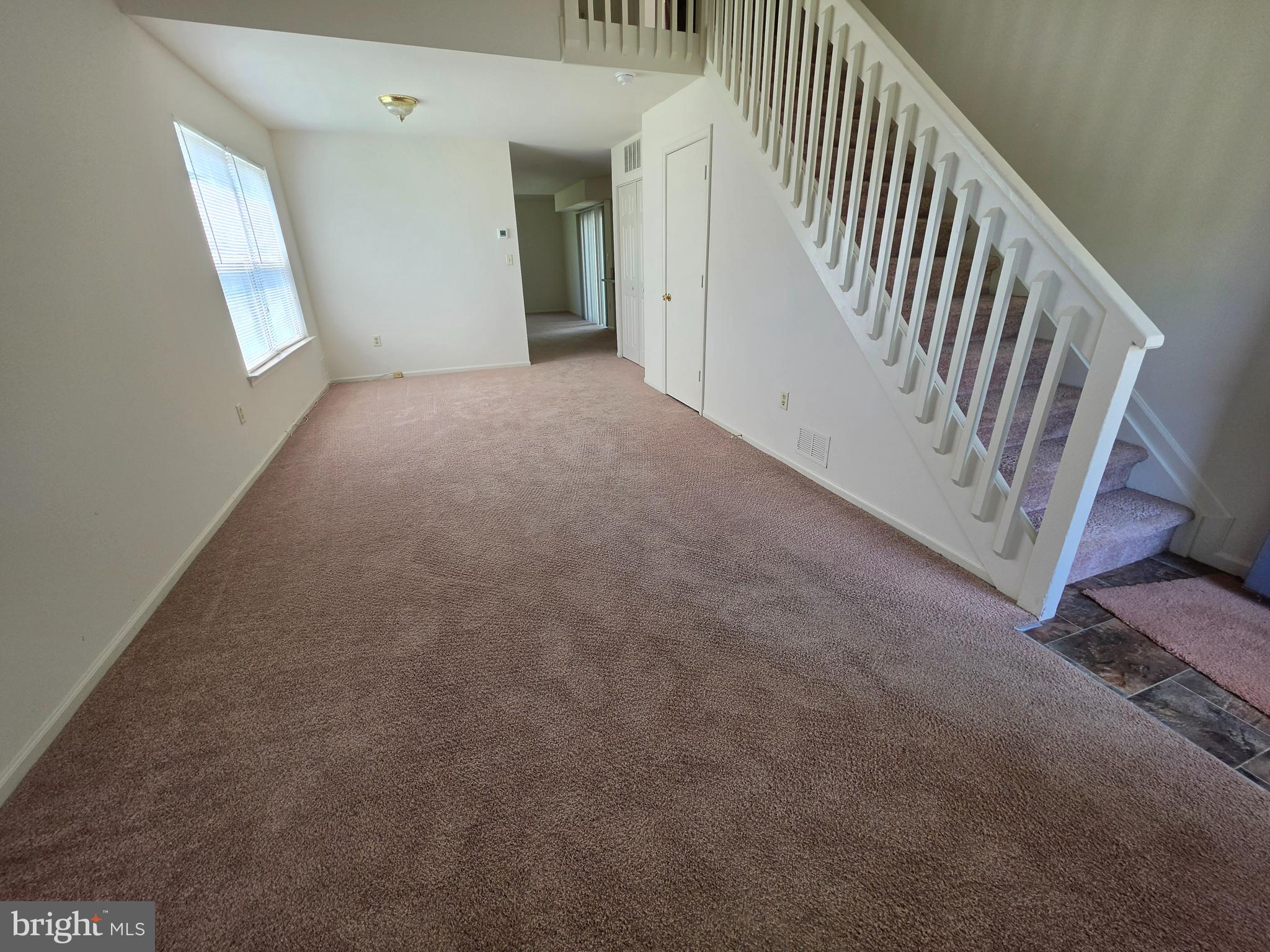 38 Heatherfield Way Dover, DE 19904 - Photo 5 of 26 a view of a hallway with window and stairs
