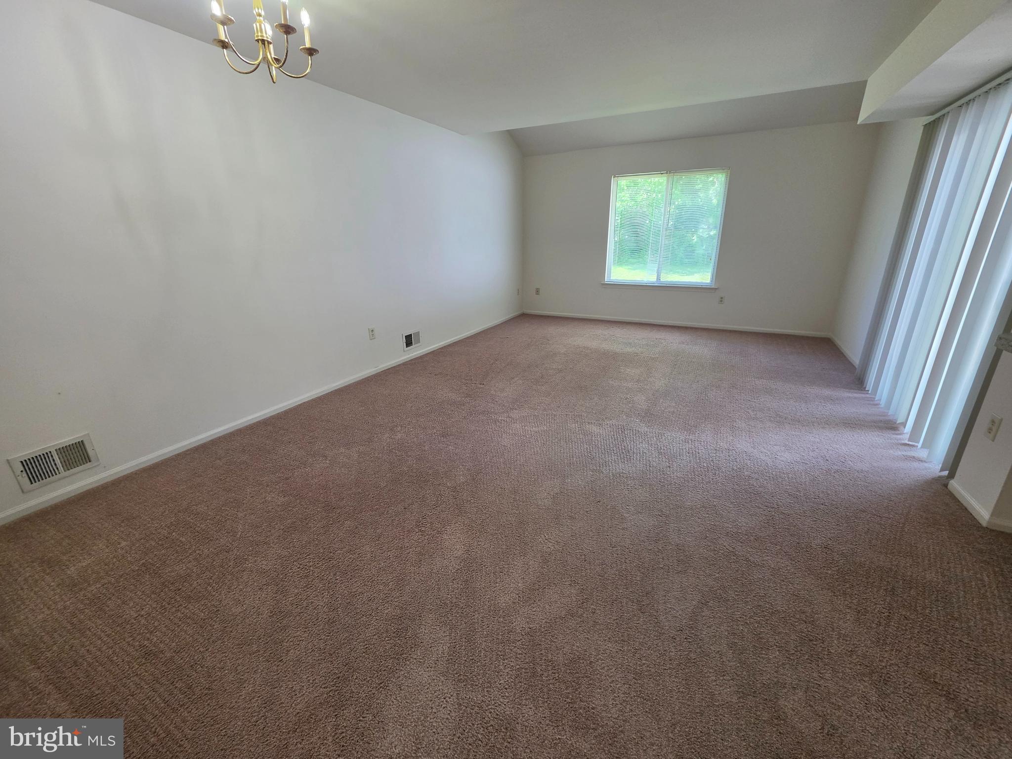 38 Heatherfield Way Dover, DE 19904 - Photo 6 of 26 an empty room with windows and entrance