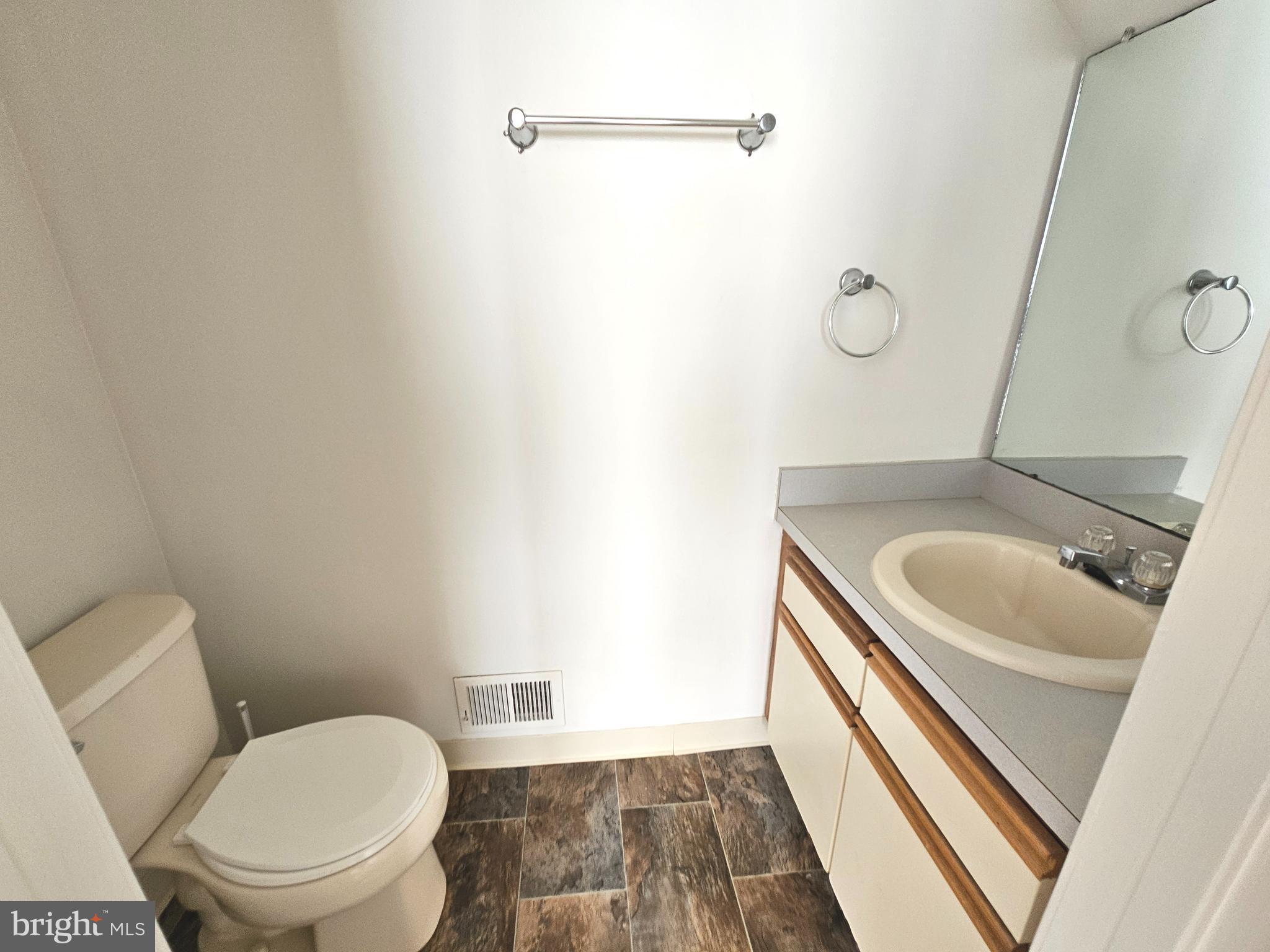 38 Heatherfield Way Dover, DE 19904 - Photo 10 of 26 a bathroom with a sink and a toilet
