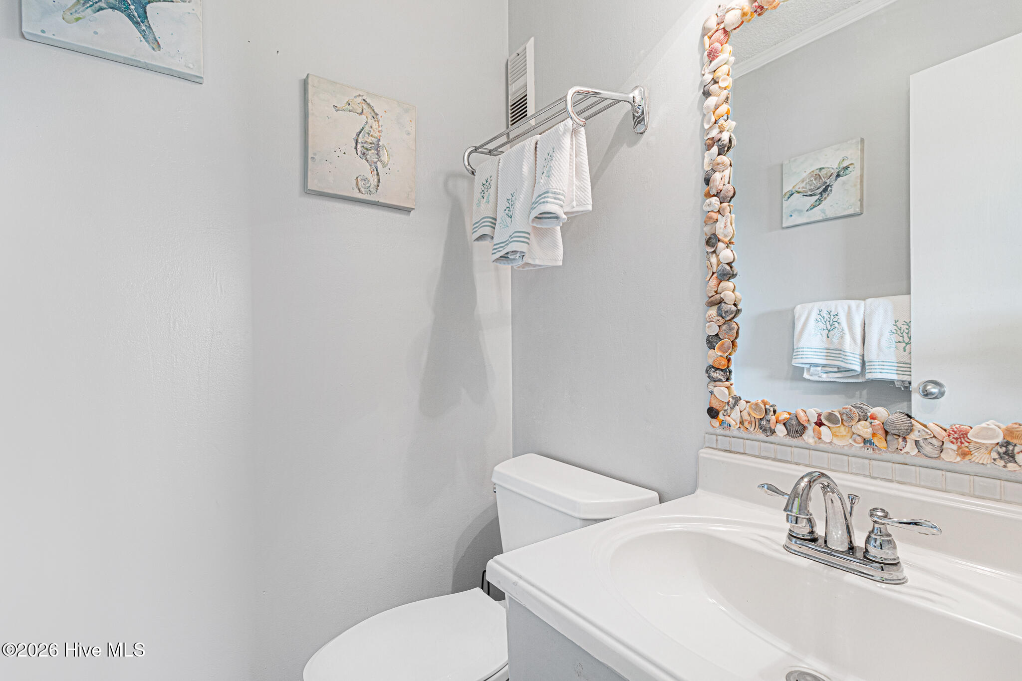 2308 West Fort Macon Road, Unit 302H Atlantic Beach, NC 28512 - Photo 28 of 60 Half Bathroom