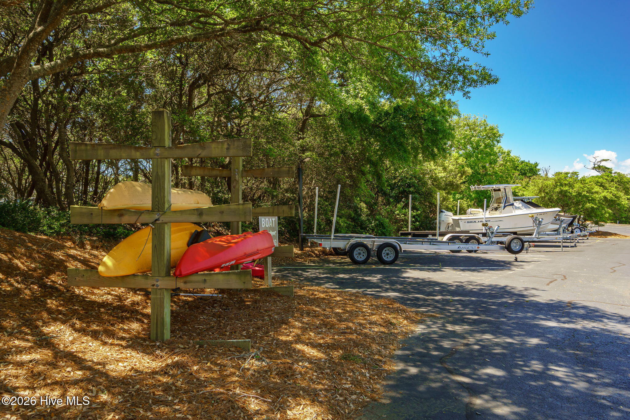 2308 West Fort Macon Road, Unit 302H Atlantic Beach, NC 28512 - Photo 51 of 61 Kayak Storage