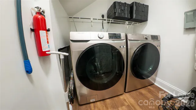 a utility room with dryer and washer