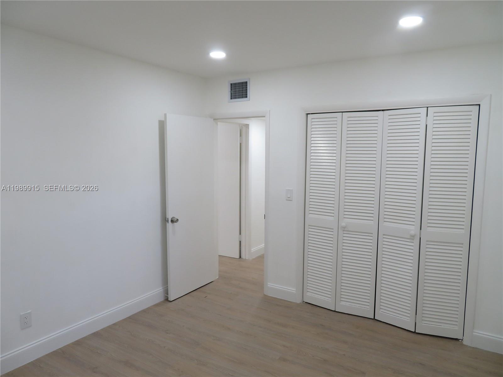 17247 Southwest 112th Place, Unit 21044 Miami, FL 33157 - Photo 16 of 21 an empty room with closet area