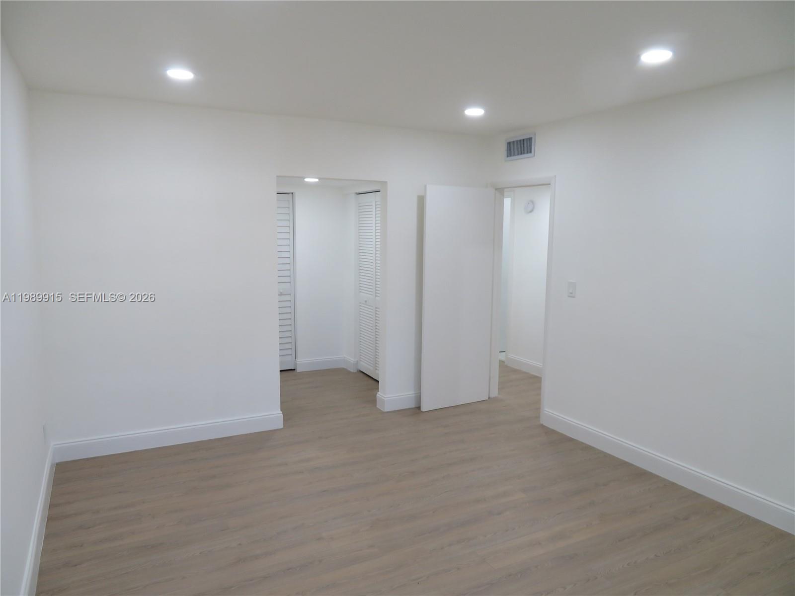 17247 Southwest 112th Place, Unit 21044 Miami, FL 33157 - Photo 17 of 21 a view of an empty room