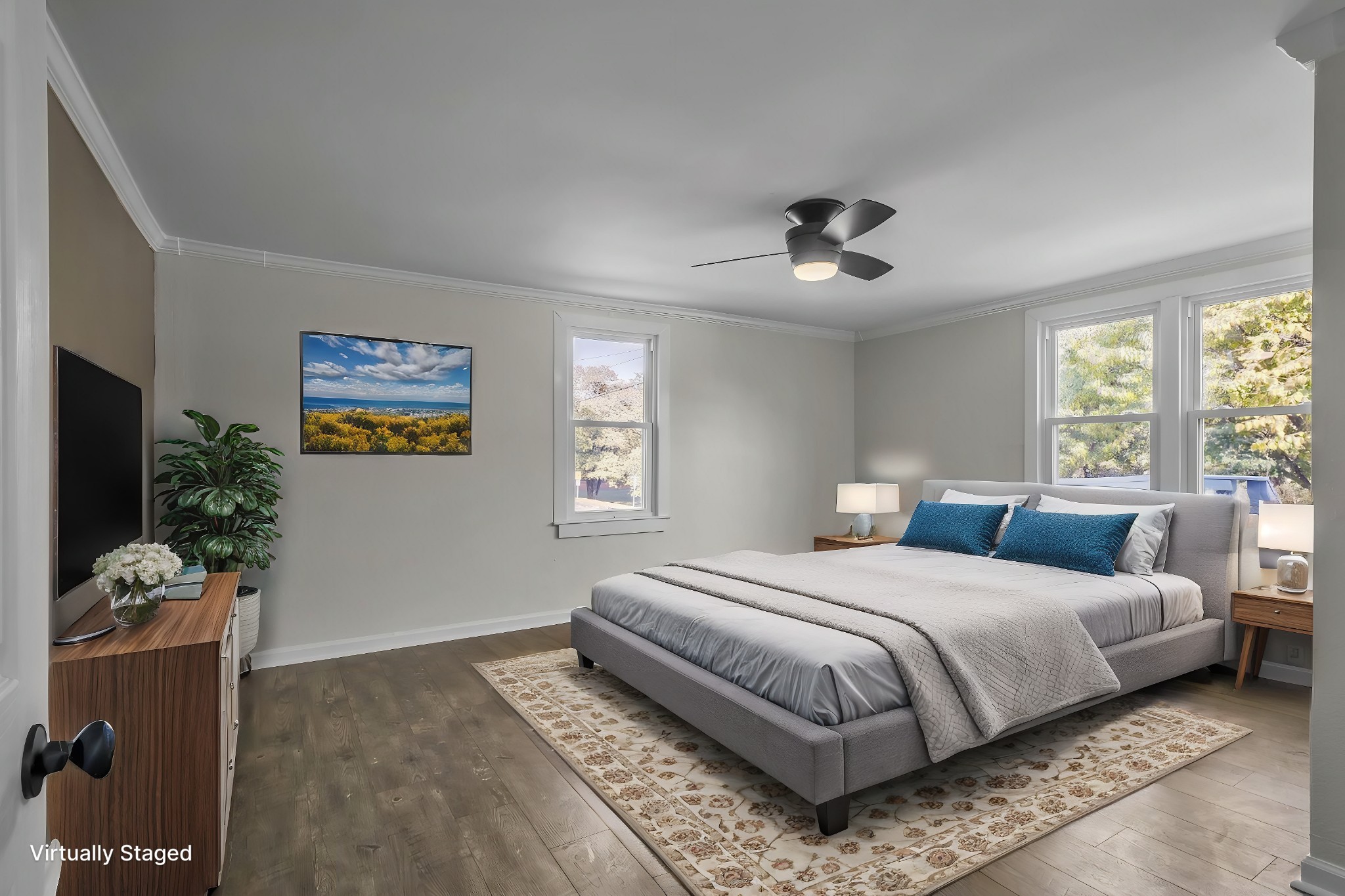 403 Carpenter Street Mount Pleasant, TN 38474 - Photo 11 of 34 a bedroom with a bed and a chandelier