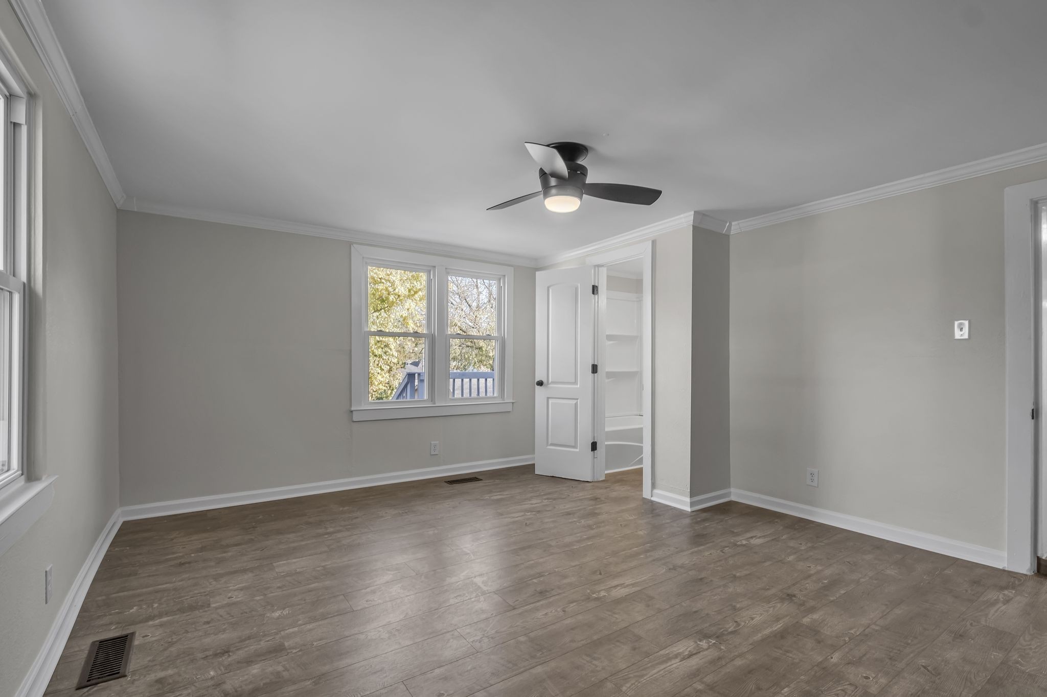 403 Carpenter Street Mount Pleasant, TN 38474 - Photo 13 of 34 a view of an empty room with a window