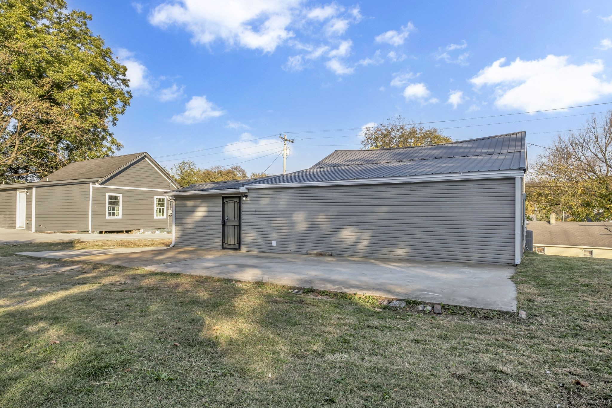403 Carpenter Street Mount Pleasant, TN 38474 - Photo 34 of 34 a view of a house with a yard