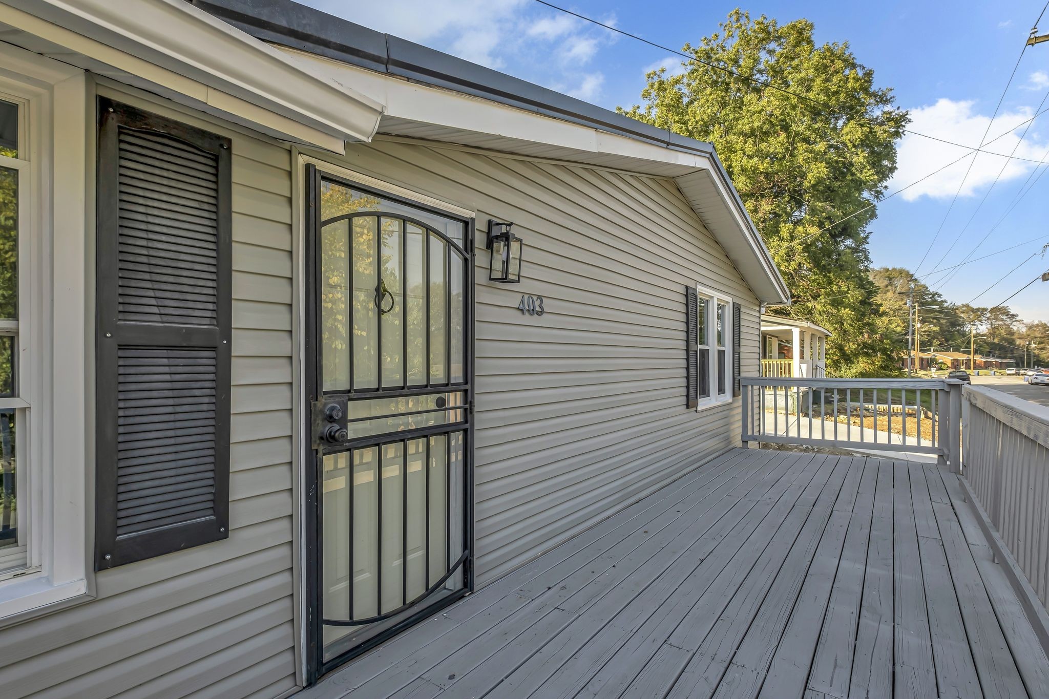 403 Carpenter Street Mount Pleasant, TN 38474 - Photo 6 of 34 a view of a balcony with wooden floor