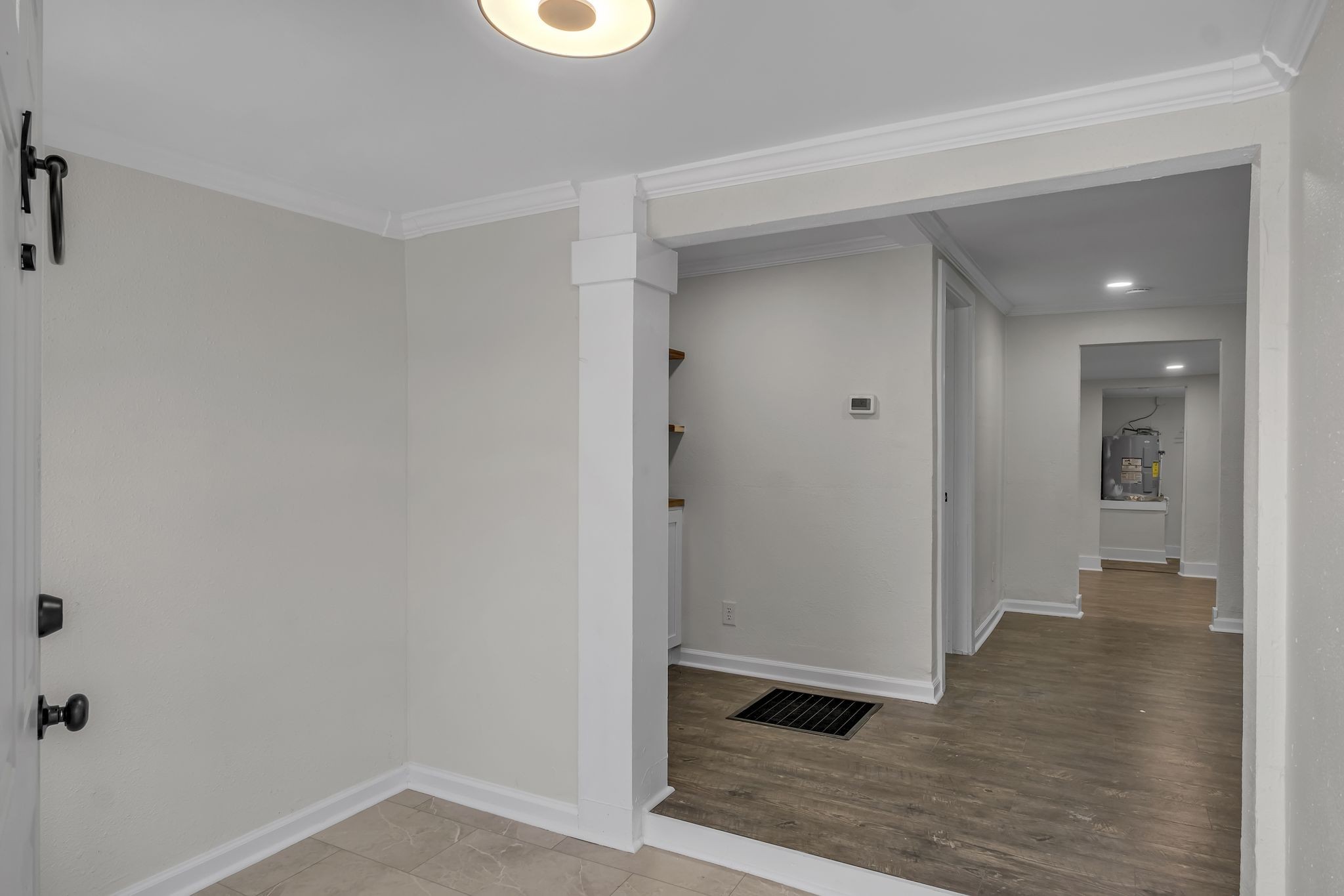 403 Carpenter Street Mount Pleasant, TN 38474 - Photo 7 of 34 a view of a hallway with wooden floor
