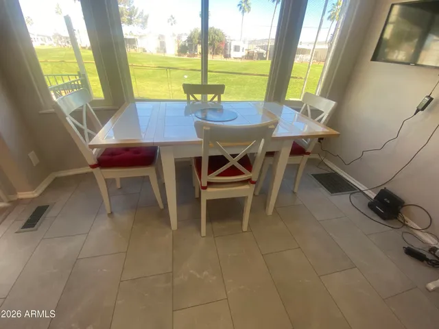 a bathroom with a sink toilet and mirror