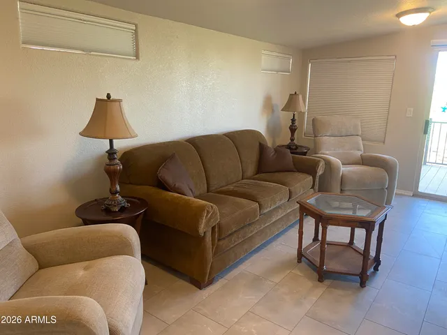 a living room with furniture and a couch