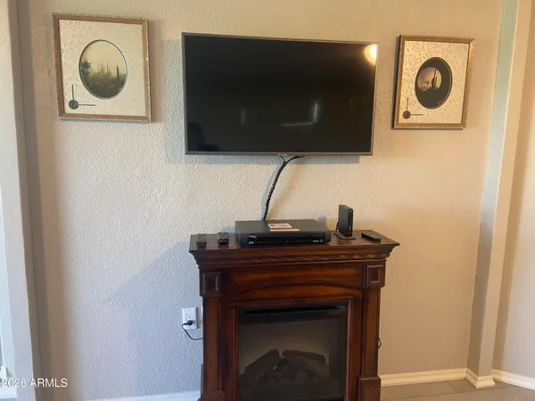 a view of a dining room with furniture and window