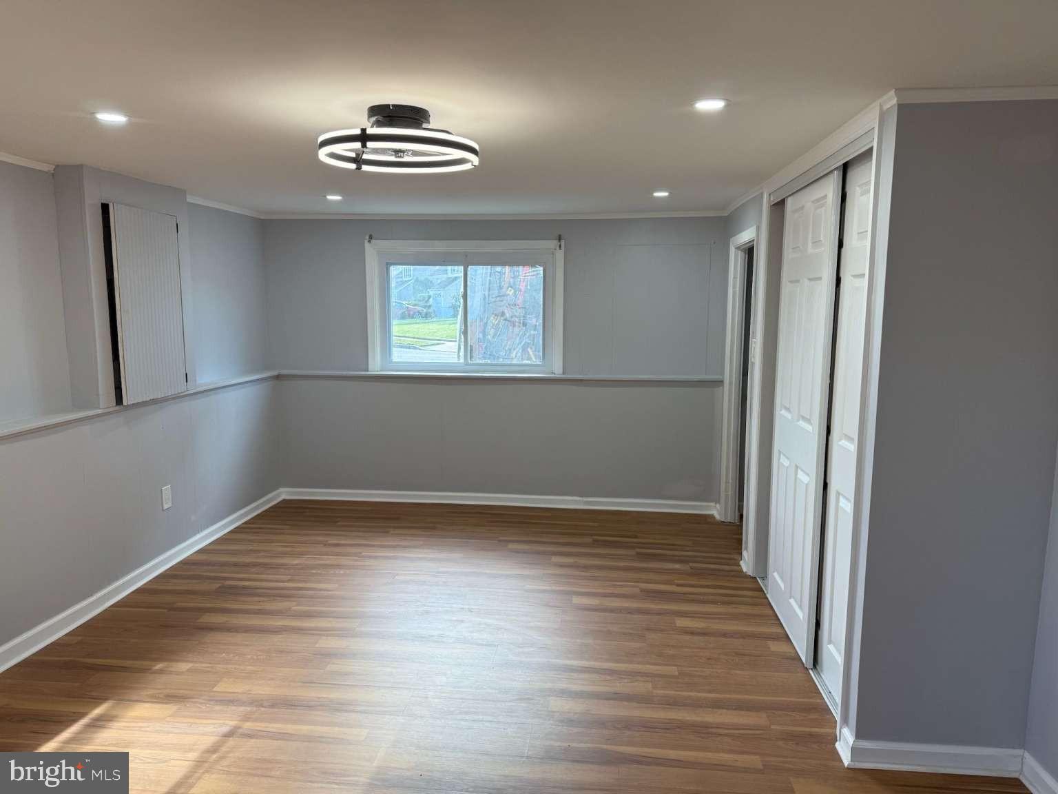 2 Tekening Way Hamilton, NJ 08690 - Photo 14 of 31 an empty room with wooden floor and windows