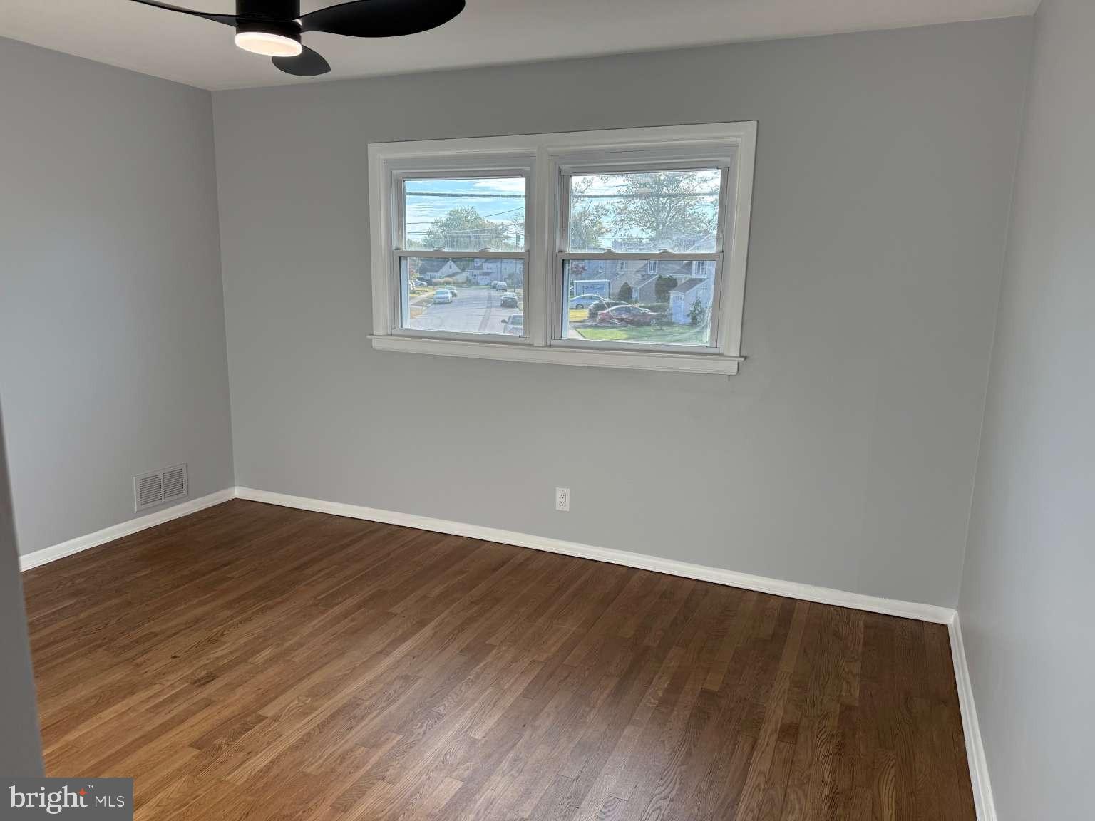 2 Tekening Way Hamilton, NJ 08690 - Photo 28 of 31 an empty room with wooden floor cabinet and windows