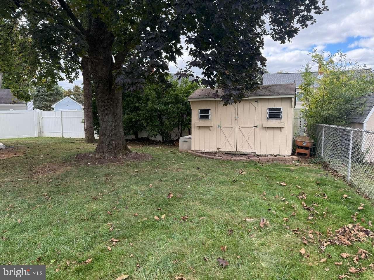 2 Tekening Way Hamilton, NJ 08690 - Photo 30 of 31 a view of a house with a tree and a yard