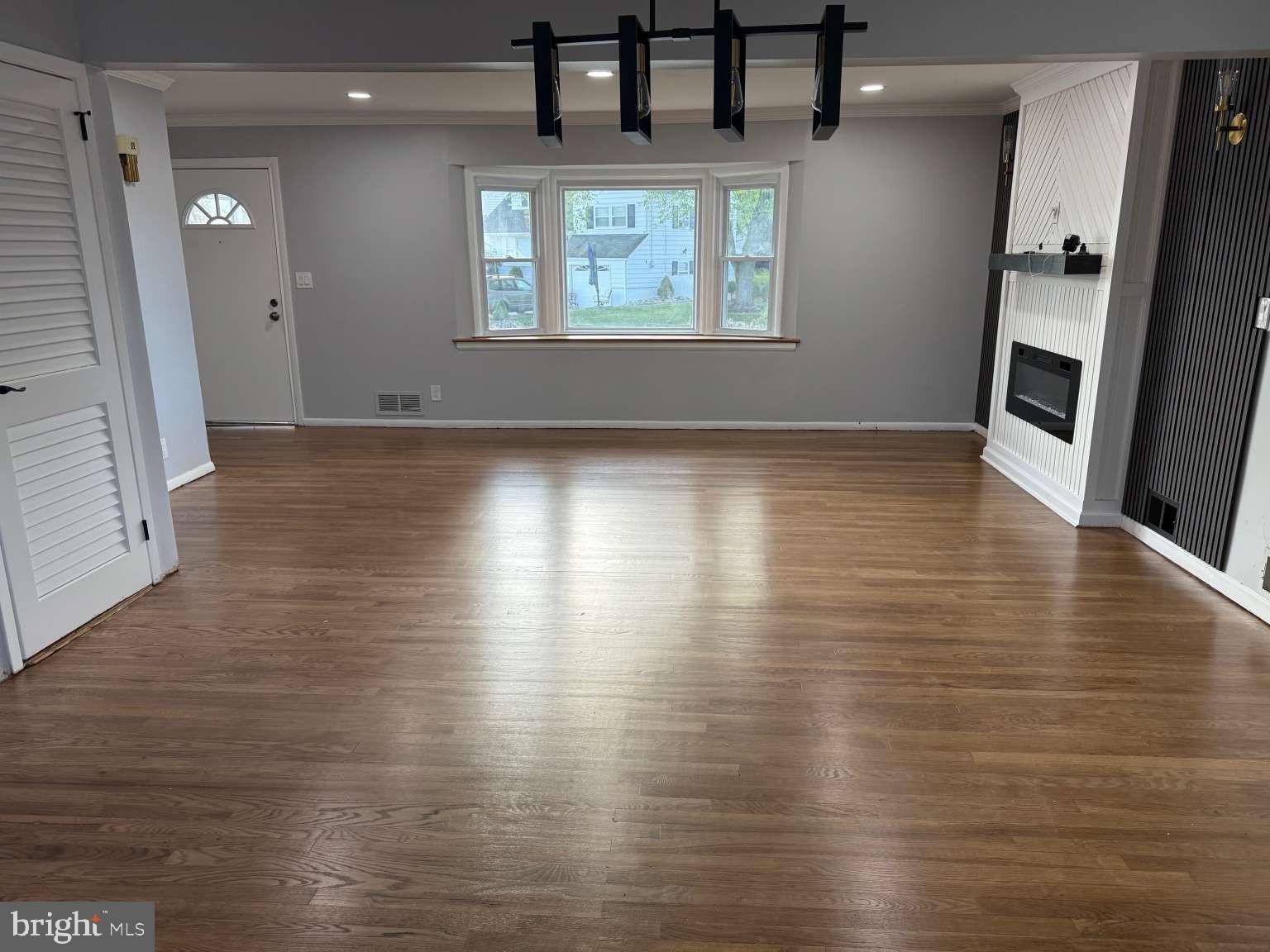 2 Tekening Way Hamilton, NJ 08690 - Photo 3 of 31 an empty room with wooden floor and windows