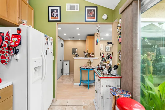 a view of living room filled with furniture and toys