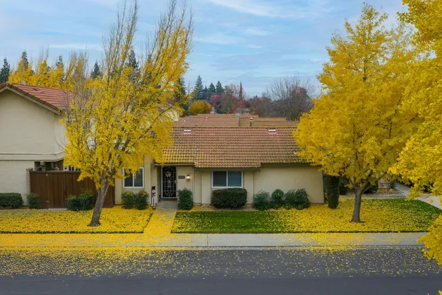a view of a house with a street