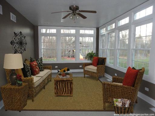32W630 Army Trail Road Wayne, IL 60184 - Photo 8 of 16 a living room with furniture and a large window