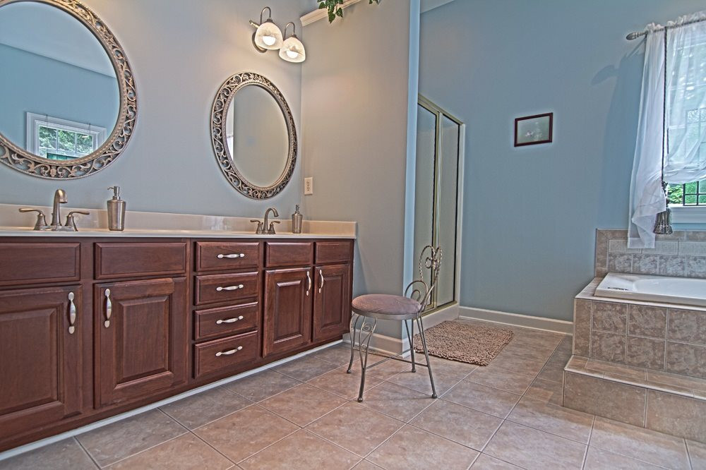 5305 Corbarron Court Raleigh, NC 27606 - Photo 14 of 21 Huge master bath with Jacuzzi tub overlooking pool and gorgeous landscaping Master Bath/Spa