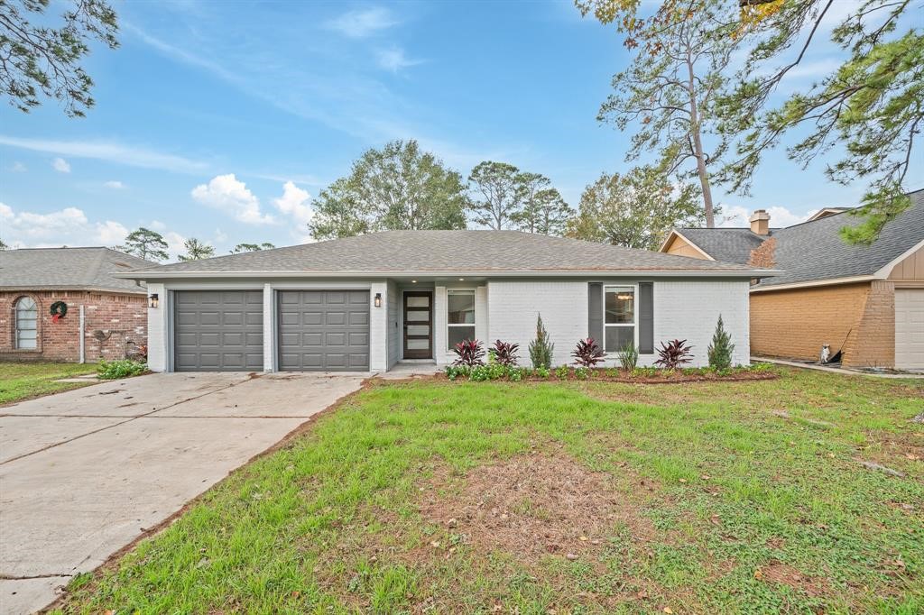 front view of a house and a yard