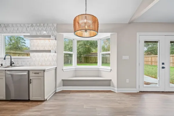 a kitchen with a window and a sink