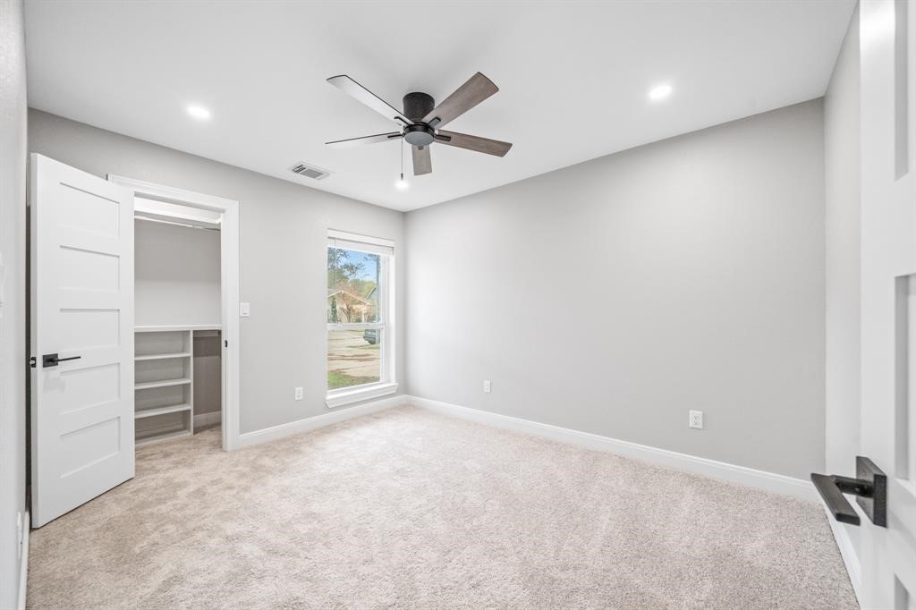 23307 Apple Arbor Drive Spring, TX 77373 - Photo 24 of 32 an empty room with closet and windows