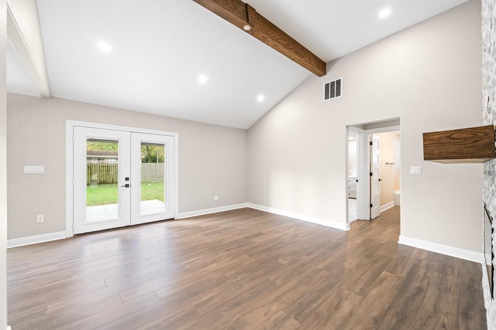 23307 Apple Arbor Drive Spring, TX 77373 - Photo 30 of 32 a view of an empty room with wooden floor and a window