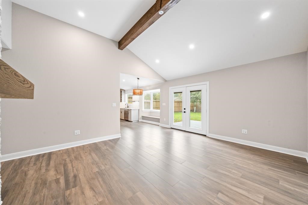23307 Apple Arbor Drive Spring, TX 77373 - Photo 31 of 32 a view of an empty room with wooden floor and a window