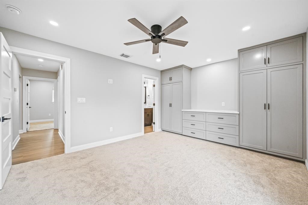 23307 Apple Arbor Drive Spring, TX 77373 - Photo 10 of 32 an empty room with cabinet and a ceiling fan