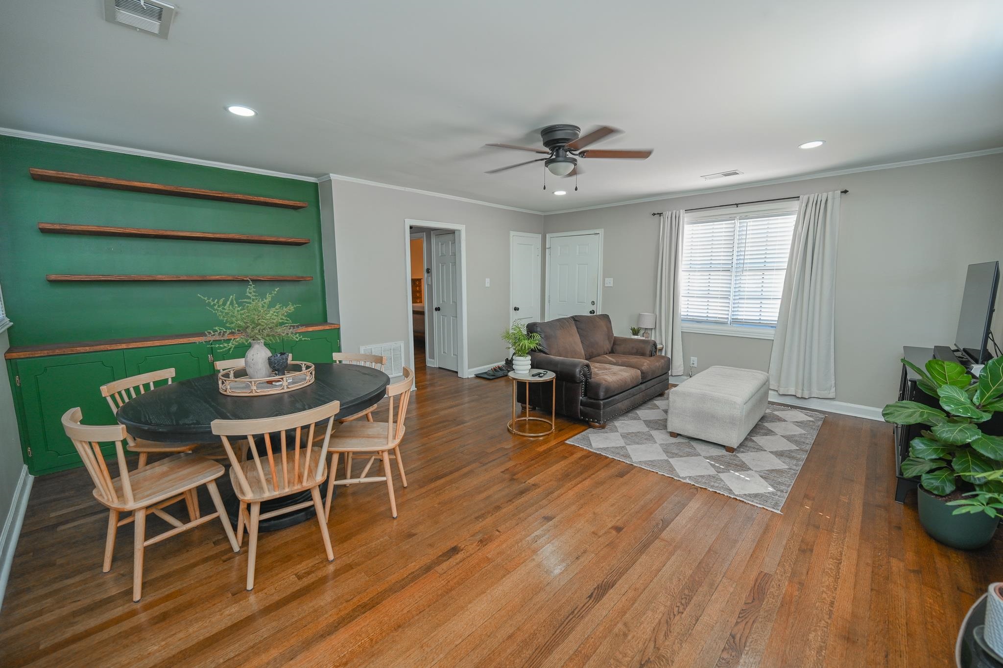 1105 Stratford Road Memphis, TN 38122 - Photo 12 of 26 Living room with crown molding, wood-type flooring, a ceiling fan, and recessed lighting