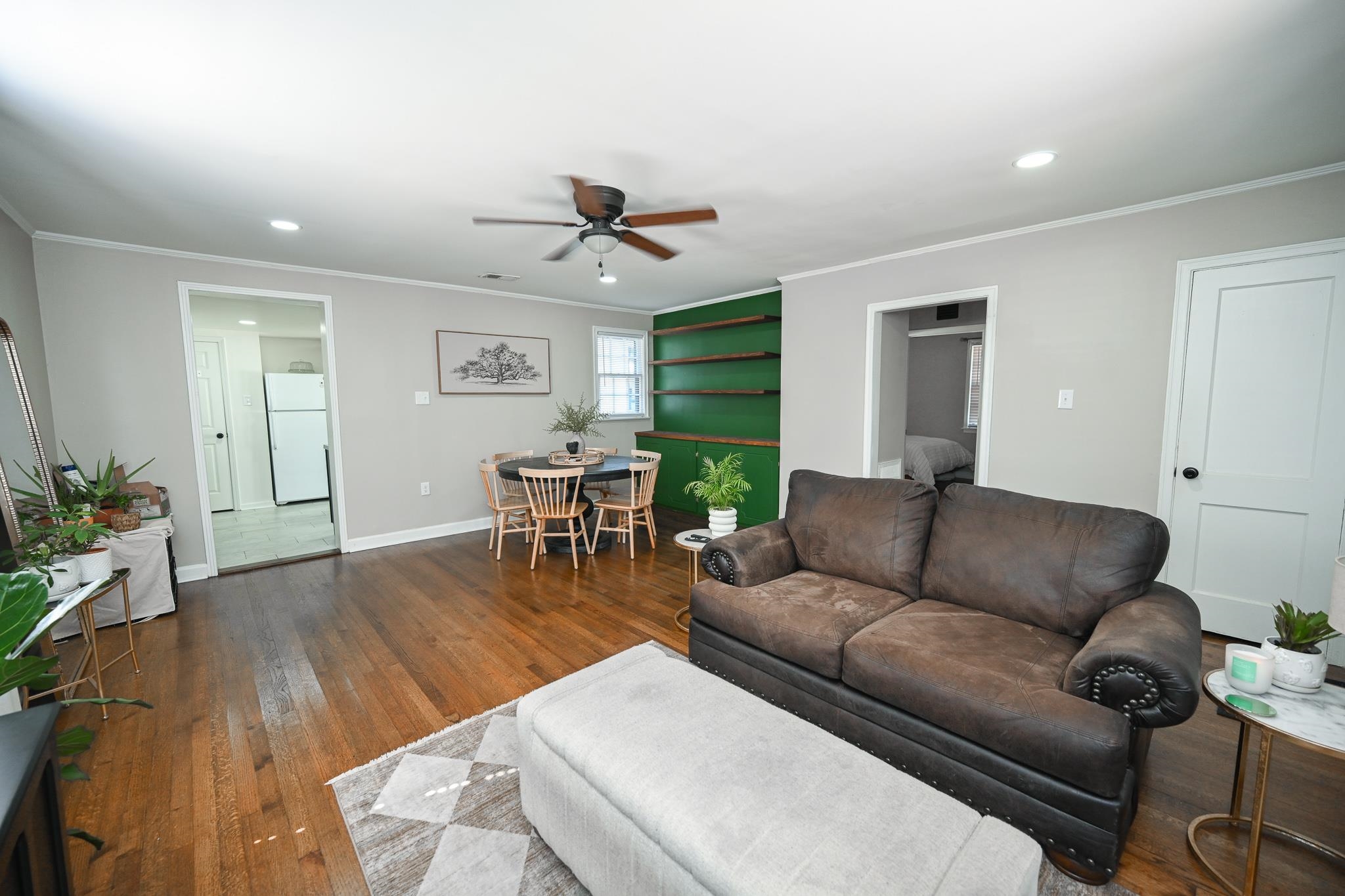1105 Stratford Road Memphis, TN 38122 - Photo 6 of 26 Living room with crown molding, hardwood / wood-style flooring, recessed lighting, and a ceiling fan