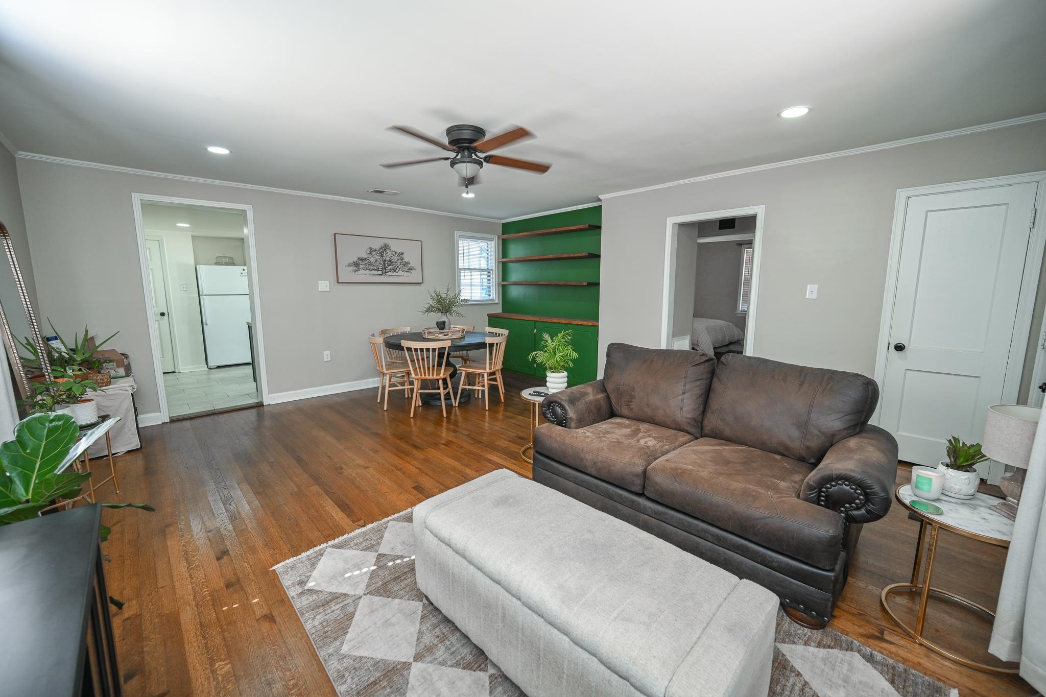 1105 Stratford Road Memphis, TN 38122 - Photo 7 of 26 Living room with ornamental molding, hardwood / wood-style floors, ceiling fan, and recessed lighting