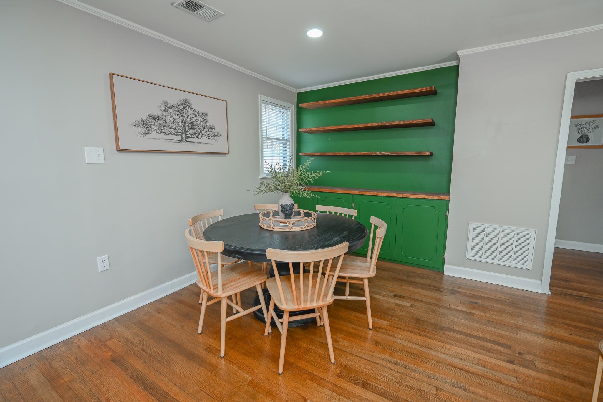 1105 Stratford Road Memphis, TN 38122 - Photo 10 of 26 Dining space featuring ornamental molding, dark wood-style flooring, and recessed lighting