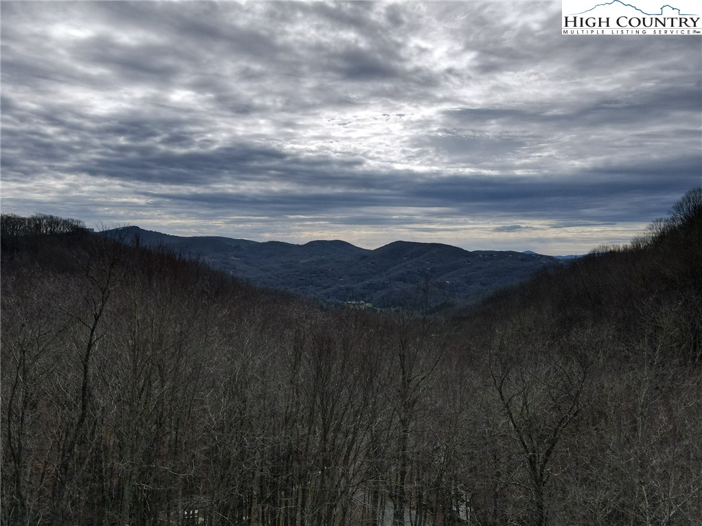G54 Sky Camp Road Banner Elk, NC 28604 - Photo 2 of 20 a view of lake with mountain