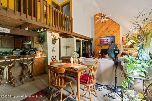 a view of dinning table and chairs in patio