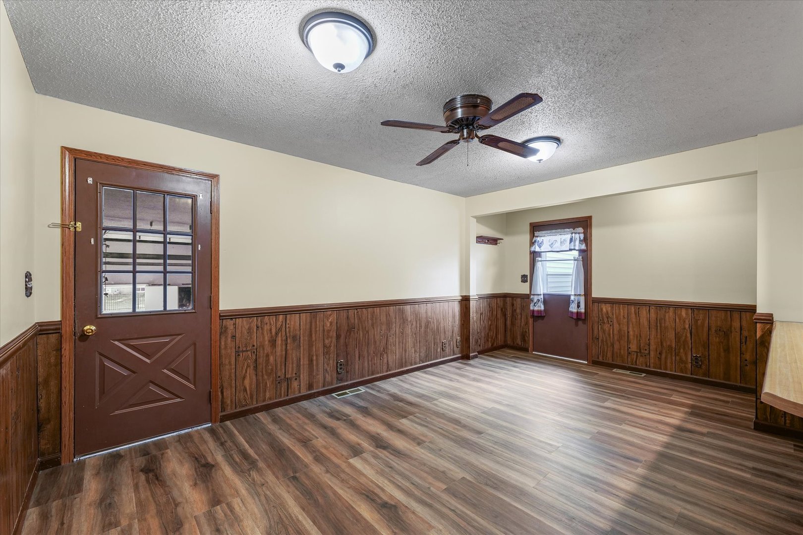 309 North Watson Street Tolono, IL 61880 - Photo 15 of 33 a view of empty room with wooden floor