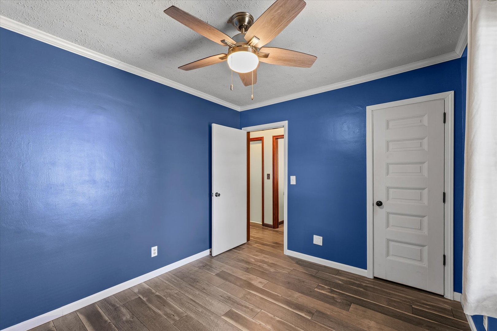 309 North Watson Street Tolono, IL 61880 - Photo 23 of 33 wooden floor and window in an empty room