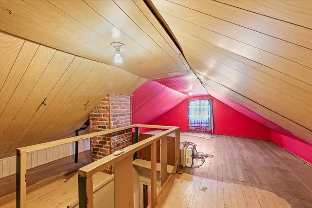 a view of entryway with wooden wall