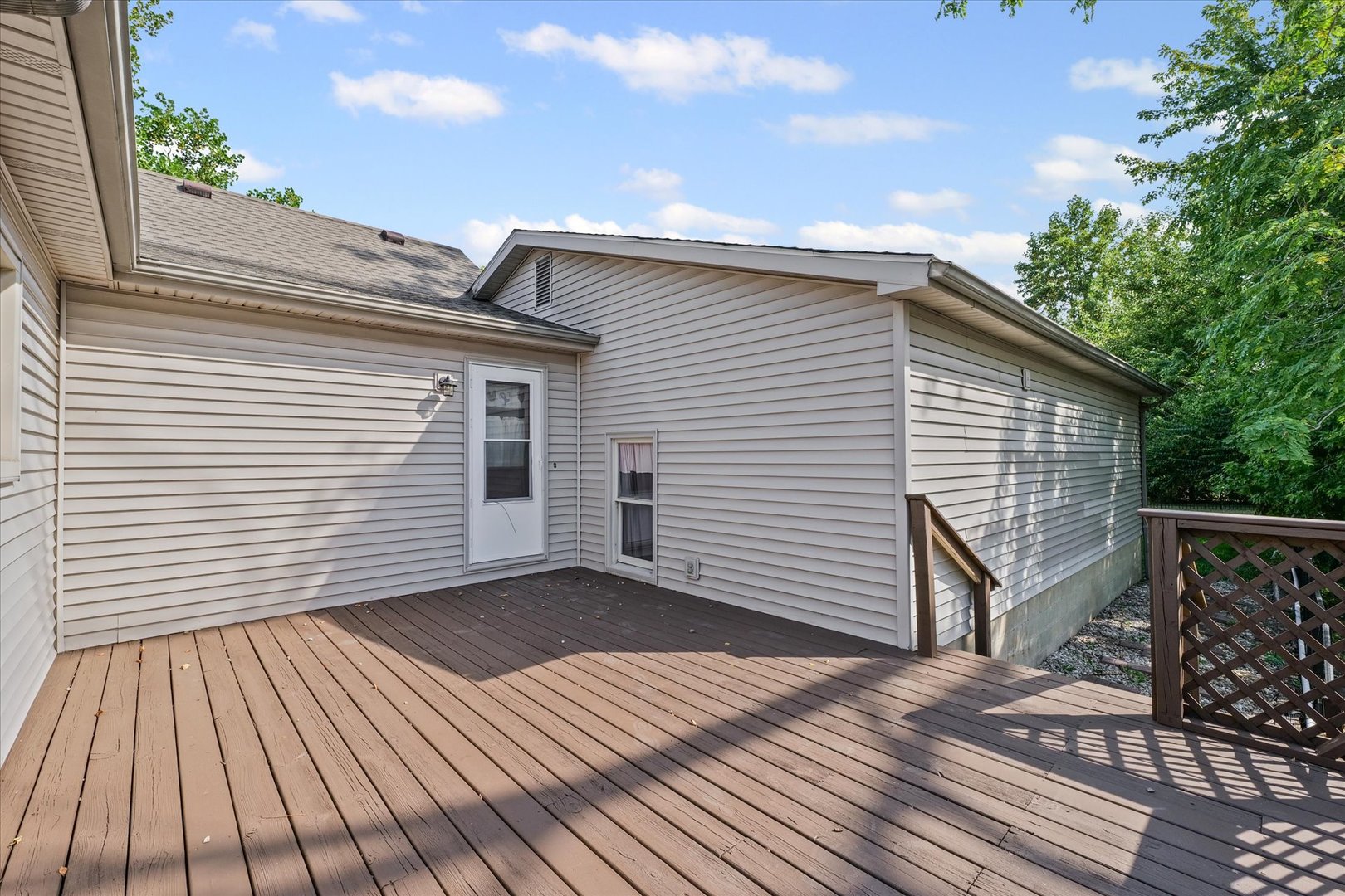 309 North Watson Street Tolono, IL 61880 - Photo 29 of 33 a view of a house with a roof deck